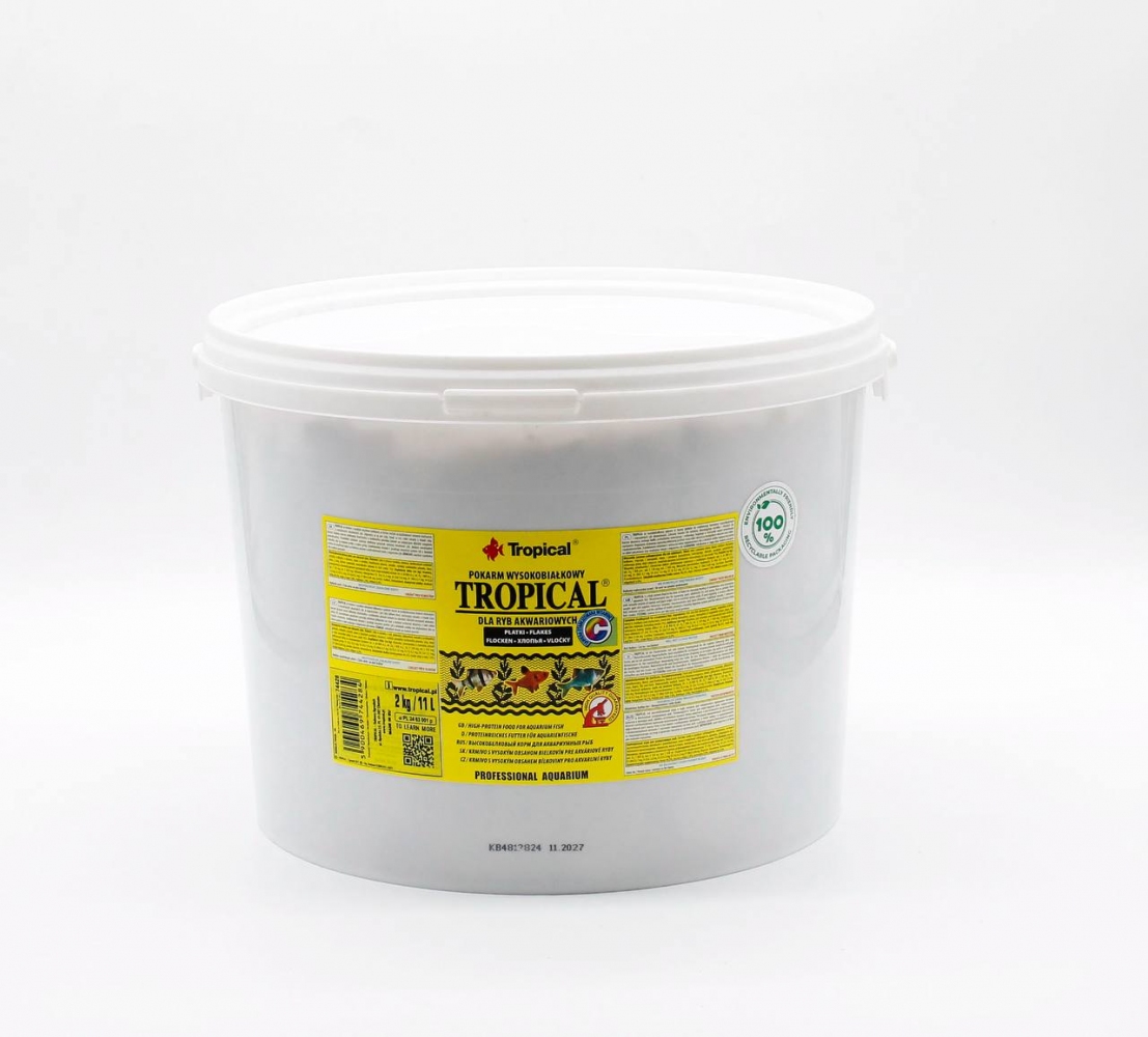 Тропікал TROPICAL високобілковий корм у вигляді пластівців.