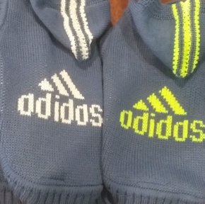 Светр в'язаний в асорт.З капюшоном